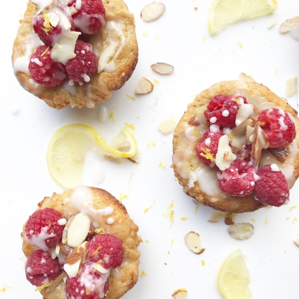 lemon poppyseed muffin topped with raspberries