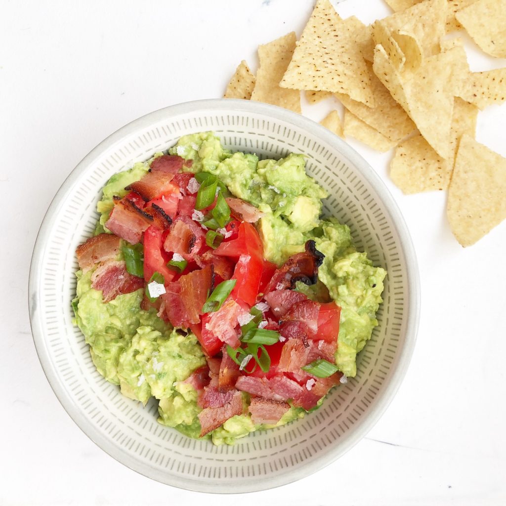 loaded guacamole with bacon and tomatoes