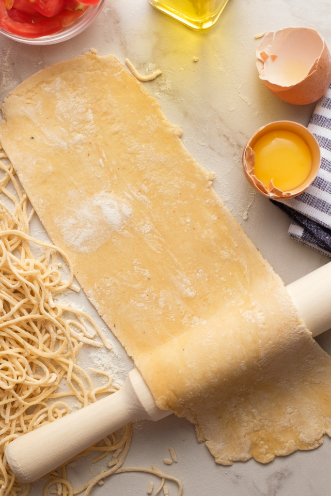 homemade pasta on a rolling pin