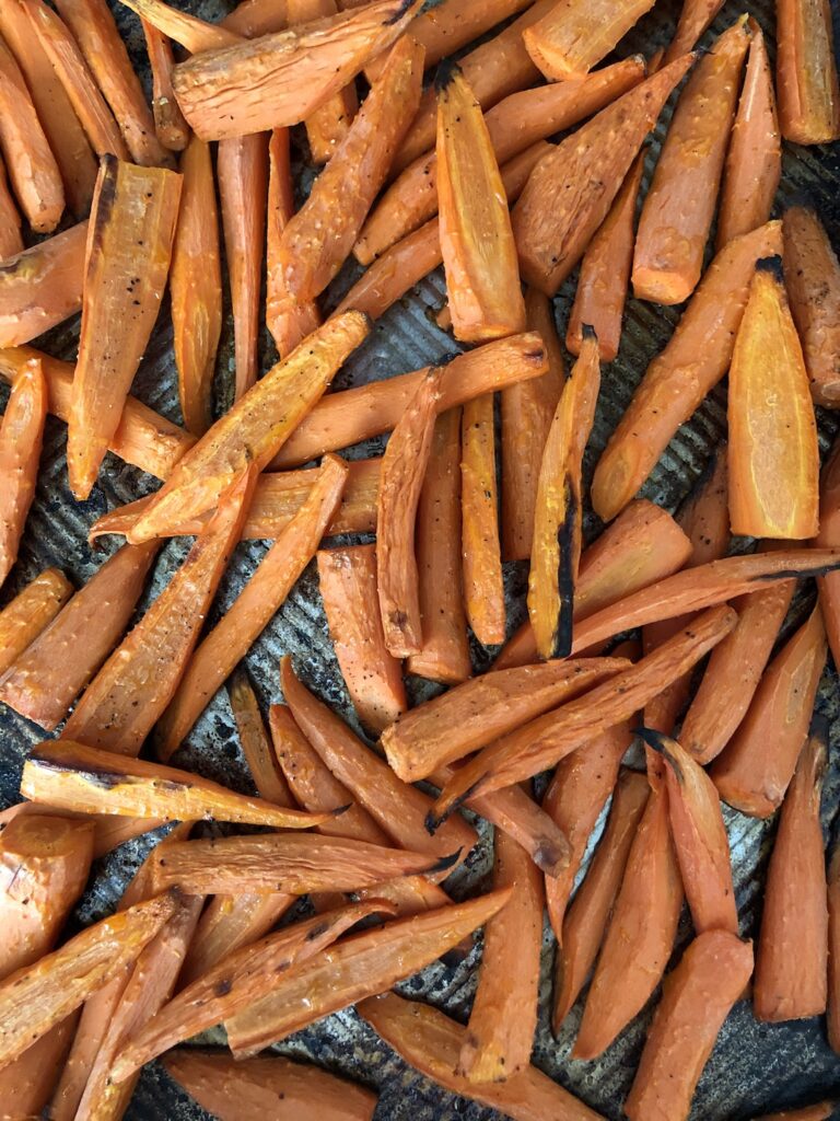 roasted carrots on a baking sheet